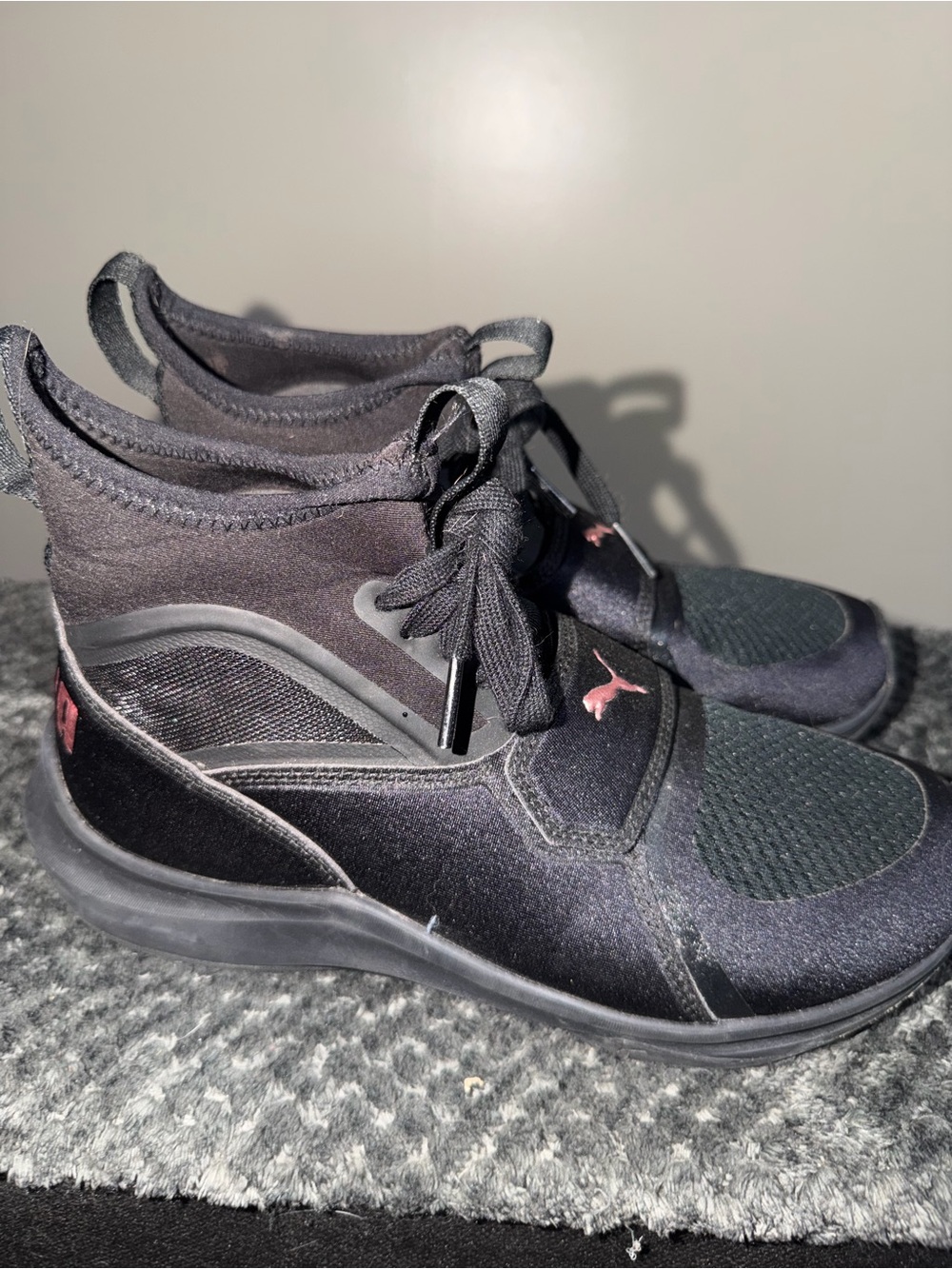 Puma Black Slip-On Athletic Shoes with Pink Logo Accent